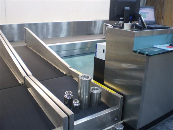 Calibration of airport luggage weighing scale.JPG